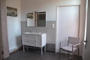 Een badkamer bij Gîte chez la Marie