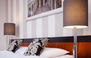Posteľ alebo postele v izbe v ubytovaní Hapimag Resort Budapest