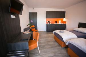 Postel nebo postele na pokoji v ubytování Apartments A7