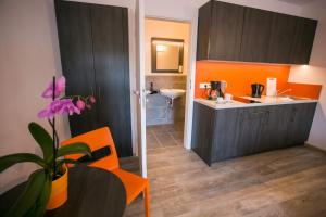 Kuchyň nebo kuchyňský kout v ubytování Apartments A7