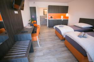 Postel nebo postele na pokoji v ubytování Apartments A7