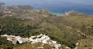 an aerial view of a village on a hill next to the ocean at Villa Kardiani in Kardhianí