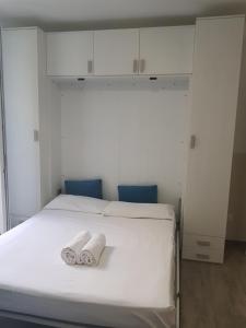 Katil atau katil-katil dalam bilik di Hotel Riviera Sanremo