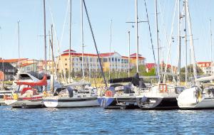 a group of boats are docked in the water at Morada Strandhotel Ostseebad Kühlungsborn in Kühlungsborn