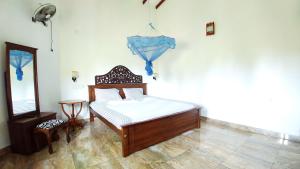 Postel nebo postele na pokoji v ubytování Guest House Basilea