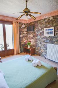 Postel nebo postele na pokoji v ubytování Faris Hotel
