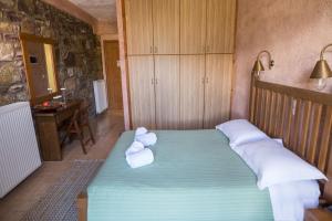 Postel nebo postele na pokoji v ubytování Faris Hotel