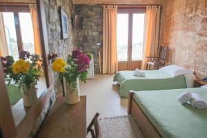 Postel nebo postele na pokoji v ubytování Faris Hotel