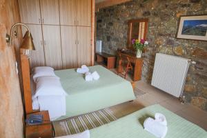 Postel nebo postele na pokoji v ubytování Faris Hotel