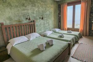 Postel nebo postele na pokoji v ubytování Faris Hotel