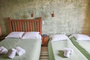 Postel nebo postele na pokoji v ubytování Faris Hotel