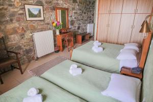 Postel nebo postele na pokoji v ubytování Faris Hotel
