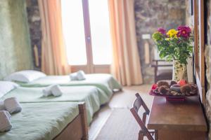 Postel nebo postele na pokoji v ubytování Faris Hotel