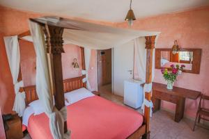 Postel nebo postele na pokoji v ubytování Faris Hotel