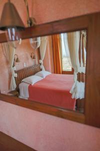 Postel nebo postele na pokoji v ubytování Faris Hotel