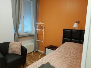 Postel nebo postele na pokoji v ubytování Hotel Kringelstaden