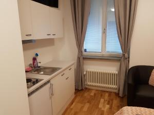 Kuchyň nebo kuchyňský kout v ubytování Hotel Kringelstaden