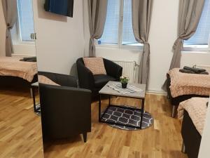 Postel nebo postele na pokoji v ubytování Hotel Kringelstaden