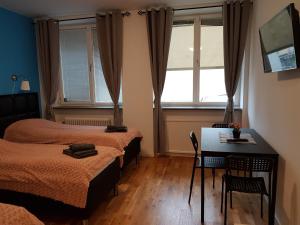 Postel nebo postele na pokoji v ubytování Hotel Kringelstaden