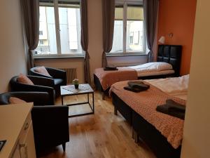 Postel nebo postele na pokoji v ubytování Hotel Kringelstaden