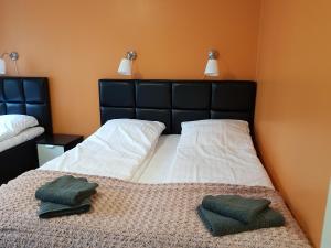 Postel nebo postele na pokoji v ubytování Hotel Kringelstaden