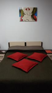 Cama o camas de una habitación en Manhattan Apartments