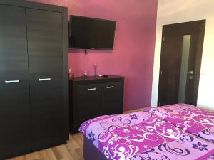Postel nebo postele na pokoji v ubytování Hotel Hokejka