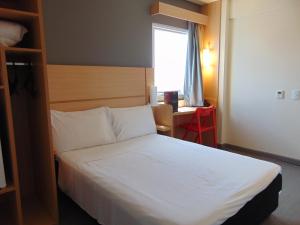 Postel nebo postele na pokoji v ubytování ibis Arapiraca