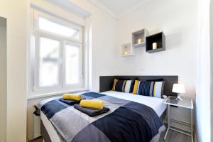 Posteľ alebo postele v izbe v ubytovaní Agape Zagreb Apartments