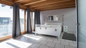Postel nebo postele na pokoji v ubytování Hotel Garni Landhaus zur Issel