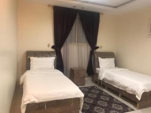 Gallery image of الماسة الخليج للشقق المخدومة in Buraydah +12 photos