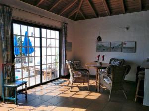 Posezení v ubytování La Hacienda BuenVivir - Apartamentos