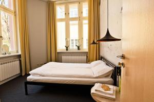 Posteľ alebo postele v izbe v ubytovaní Sleep in Hostel & Apartments Stary Rynek