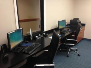 an office with two desks with laptops on them at Wingate by Wyndham - York in York