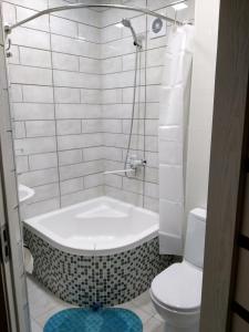 Een badkamer bij Apartment on Oloy 11