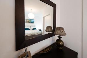 Posteľ alebo postele v izbe v ubytovaní Family Nest Overlooking Lake Como - by Rent All Como