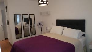 Cama o camas de una habitación en Miraflores 820