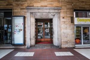 an entrance to a building with a revolving door at Central cosy apartment in Bologna