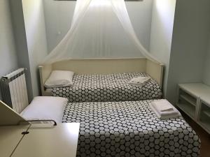 Postel nebo postele na pokoji v ubytování Buellis House