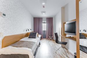 Ένα ή περισσότερα κρεβάτια σε δωμάτιο στο Hotel Spekeröd