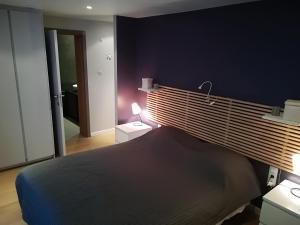 Postel nebo postele na pokoji v ubytování L'appart Bousval