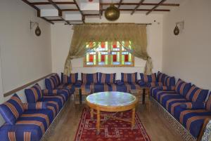 Istumisnurk majutusasutuses Maison d'hôtes Tinwitchi