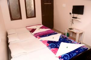 Postel nebo postele na pokoji v ubytování Hotel Parag