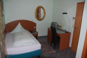 Postel nebo postele na pokoji v ubytování Hotel & Restaurant Garda