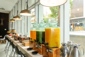 a kitchen filled with lots of different types of drinks at Innside Lima Miraflores in Lima