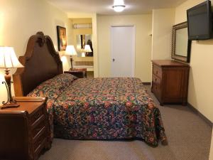 Cama ou camas em um quarto em Hacienda Motel