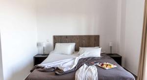 Postel nebo postele na pokoji v ubytování Caldera Romantica Hotel
