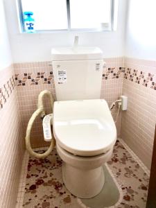 Koupelna v ubytování Obasute Guesthouse Nakaraya + 14 fotografií