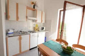 Kuchyň nebo kuchyňský kout v ubytování Apartments Josip + 22 fotografií