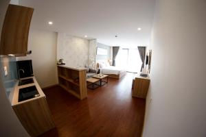 Kuchyň nebo kuchyňský kout v ubytování LiLy Apartment
